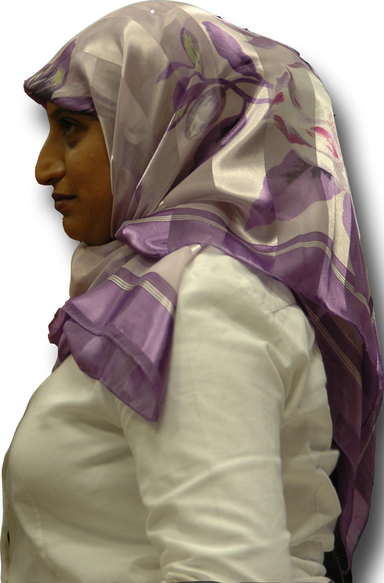 A profile photo of a woman wearing a head scarf.