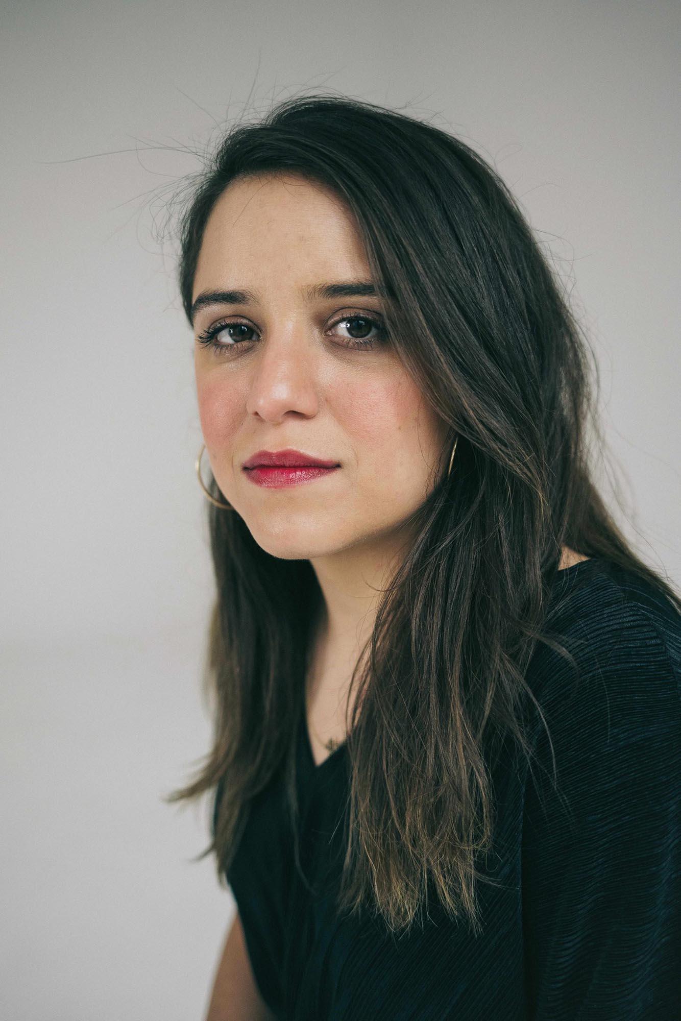 Isabel Castro looks at the camera.
