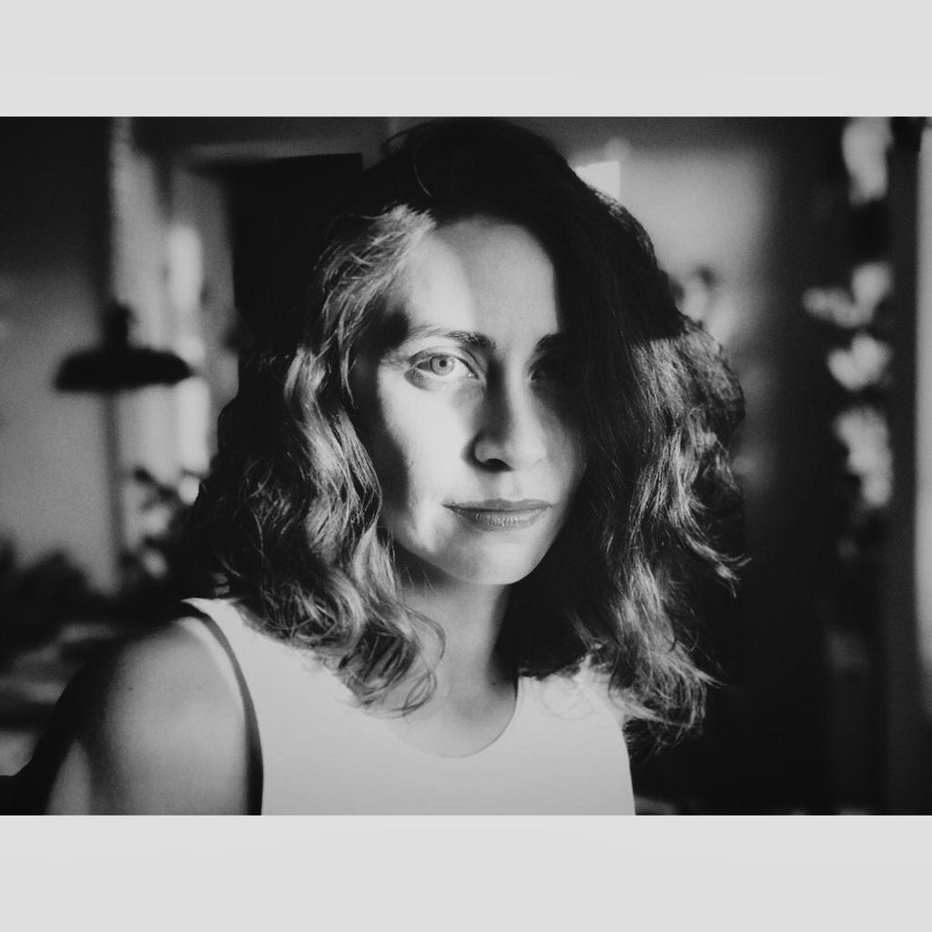 Nancy Sabbagh producer headshot in black and white.